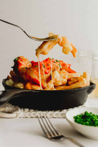 Fries, lobster, shrimps, cheese