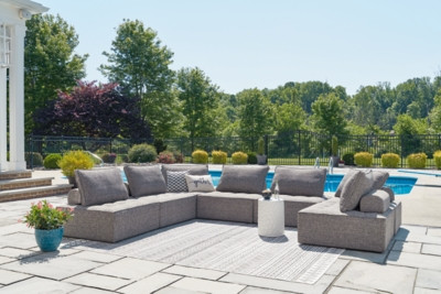 Ashley Bree Zee Brown 7-Piece Outdoor Sectional