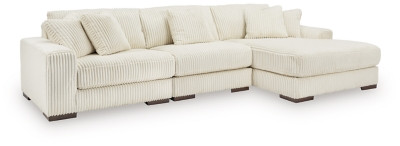 Ashley Lindyn Ivory 3-Piece Sectional with Ottoman