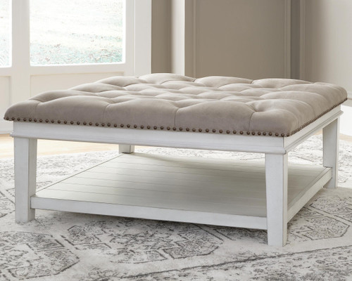 Ashley Kanwyn Grayish Brown White Upholstered Ottoman Coffee Table
