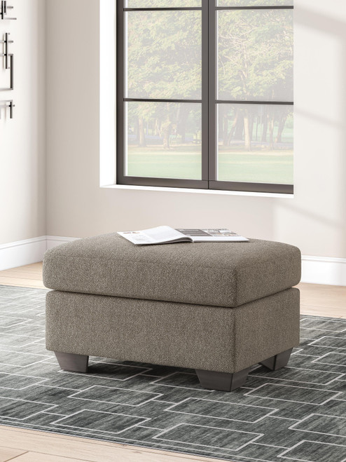 Benchcraft Triston-Peaks Suede Ottoman
