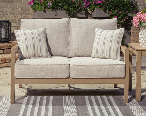 Ashley Hallow Creek Driftwood Outdoor Loveseat with Cushion