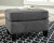 Benchcraft Agleno Charcoal Ottoman