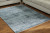 Ashley Rhysill Teal 5' x 7' Rug