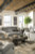 Ashley Mitchiner Fog Reclining Sofa with Drop Down Table