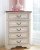 Ashley Realyn Chipped White Chest of Drawers