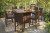 Ashley Paradise Trail Medium Brown Outdoor Bar Table and 8 Barstools