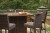 Ashley Paradise Trail Medium Brown Outdoor Bar Table and 8 Barstools