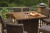 Ashley Paradise Trail Medium Brown Outdoor Bar Table and 8 Barstools