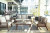 Ashley Emmeline Brown Beige Outdoor Sofa, Loveseat and 2 Lounge Chairs with Coffee Table and 2 End Tables