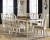 Ashley Realyn Chipped White 9-Piece Dining Set with Rectangular Table and 8 Ribbon Back Chairs
