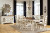 Ashley Realyn Chipped White 9-Piece Dining Set with Rectangular Table, 6 Ladderback Chairs and 2 Ribbon Back Chairs