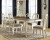 Ashley Realyn Chipped White 7-Piece Dining Set with Rectangular Table and 6 Ladderback Chairs