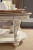 Ashley Realyn White Brown Oval Coffee Table with 1 Mirrored Door Chairside End Table