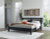 Ashley Danziar Black Queen Panel Bed with Mirrored Dresser and Nightstand