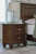 Ashley Danabrin Brown King Panel Bed with Mirrored Dresser and Nightstand