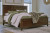 Ashley Danabrin Brown King Panel Bed with Mirrored Dresser and Chest