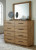 Ashley Dakmore Brown California King Upholstered Bed with Mirrored Dresser, Chest and 2 Nightstands