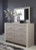 Ashley Surancha Gray Queen Poster Bed with Mirrored Dresser