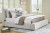 Ashley Cabalynn Light Brown King Upholstered Bed with Mirrored Dresser and 2 Nightstands