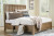 Ashley Cabalynn Light Brown King Panel Bed with Storage with Mirrored Dresser, Chest and Nightstand