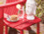 Ashley Sundown Treasure Red Outdoor Chair with End Table