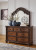 Ashley Lavinton Brown King Poster Bed with Mirrored Dresser