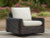 Ashley Kimora Beige Dark Brown Outdoor Swivel Lounge Chair