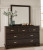 Ashley Covetown Dark Brown Queen Panel Bed with Mirrored Dresser and Chest