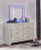 Ashley Zyniden Silver King Upholstered Panel Bed with Mirrored Dresser, Chest and 2 Nightstands