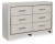 Ashley Zyniden Silver King Upholstered Panel Bed with Dresser