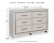 Ashley Zyniden Silver King Upholstered Panel Bed with Dresser
