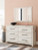Ashley Lawroy Light Natural King Panel Bed with Mirrored Dresser, Chest and 2 Nightstands B100/14/B2310/56/58/60(2)/31/36/46/92(2)