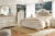 Ashley Realyn Two-tone Queen Upholstered Bed with Mirrored Dresser and 2 Nightstands