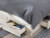 Ashley Lawroy Light Natural Queen Panel Storage Bed with Dresser