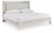 Ashley Zyniden Silver King Upholstered Panel Bed with Mirrored Dresser and 2 Nightstands