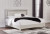 Ashley Zyniden Silver King Upholstered Panel Bed with Mirrored Dresser
