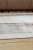Ashley Larkport Cream Brown Gray Washable 5' x 7' Area Rug