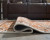 Ashley Qaabiz Sienna Ivory Black 5' x 7' Area Rug