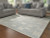 Ashley Dylanton Ivory Blue 7'8" x 10' Area Rug Ashley Dylanton Ivory Blue 7'8" x 10' Area Rug
