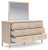 Ashley Cadmori Brown Queen Upholstered Panel Bed with Mirrored Dresser, Chest and Nightstand Ashley Cadmori Brown Queen Upholstered Panel Bed with Mirrored Dresser, Chest and Nightstand