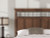 Ashley Taffenbrook Medium Brown Queen Panel Storage Bed
