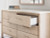 Ashley Cadmori Brown Queen Upholstered Panel Bed with Mirrored Dresser