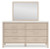 Ashley Cadmori Brown Queen Upholstered Panel Bed with Mirrored Dresser