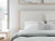 Ashley Cadmori Brown Queen Upholstered Panel Bed with Mirrored Dresser
