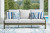 Ashley Rainier Ranch Brown Beige Outdoor Sofa and 2 Chairs with Coffee Table