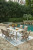 Ashley Carisbo Beige Outdoor Dining Table and 6 Chairs P690/625/602A(3)