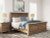 Ashley Vandenmore Medium Brown King Panel Bed with Mirrored Dresser, Chest and 2 Nightstands