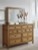 Ashley Sharlance Light Brown California King Upholstered Panel Bed with Mirrored Dresser, Chest and Nightstand