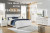 Ashley Fortman White King Panel Storage Bed with Dresser and Chest